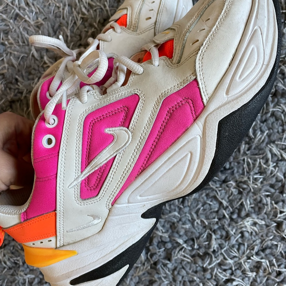 Size 9.5 women Nike shoes, white with neon orange, pink, and yellow